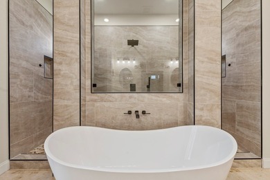 Stunning 2023 custom one-story home on a beautifully treed on Cedar Creek Country Club in Texas - for sale on GolfHomes.com, golf home, golf lot