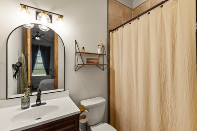 Stunning 2023 custom one-story home on a beautifully treed on Cedar Creek Country Club in Texas - for sale on GolfHomes.com, golf home, golf lot