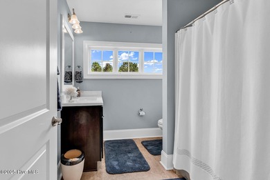 Welcome to exceptional living at 3032 Eno Lane, a custom-built on Cape Fear National At Brunswick Forest in North Carolina - for sale on GolfHomes.com, golf home, golf lot