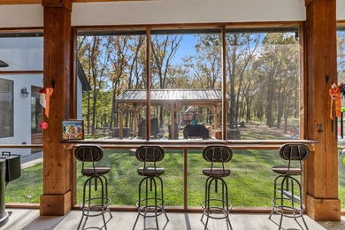 Stunning 2023 custom one-story home on a beautifully treed on Cedar Creek Country Club in Texas - for sale on GolfHomes.com, golf home, golf lot