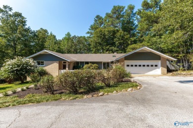 Immaculate and stunning, this one welcomes you in, and makes you on Burningtree Country Club in Alabama - for sale on GolfHomes.com, golf home, golf lot