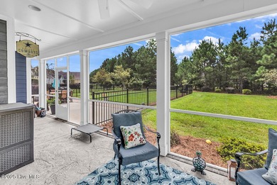 Welcome to exceptional living at 3032 Eno Lane, a custom-built on Cape Fear National At Brunswick Forest in North Carolina - for sale on GolfHomes.com, golf home, golf lot