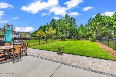 Welcome to exceptional living at 3032 Eno Lane, a custom-built on Cape Fear National At Brunswick Forest in North Carolina - for sale on GolfHomes.com, golf home, golf lot