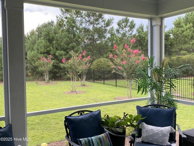 Welcome to exceptional living at 3032 Eno Lane, a custom-built on Cape Fear National At Brunswick Forest in North Carolina - for sale on GolfHomes.com, golf home, golf lot