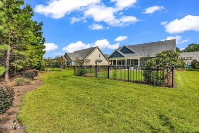 Welcome to exceptional living at 3032 Eno Lane, a custom-built on Cape Fear National At Brunswick Forest in North Carolina - for sale on GolfHomes.com, golf home, golf lot