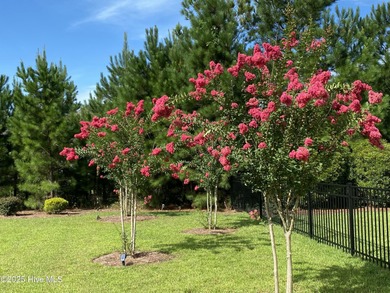 Welcome to exceptional living at 3032 Eno Lane, a custom-built on Cape Fear National At Brunswick Forest in North Carolina - for sale on GolfHomes.com, golf home, golf lot
