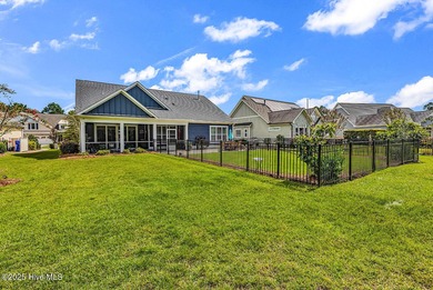 Welcome to exceptional living at 3032 Eno Lane, a custom-built on Cape Fear National At Brunswick Forest in North Carolina - for sale on GolfHomes.com, golf home, golf lot