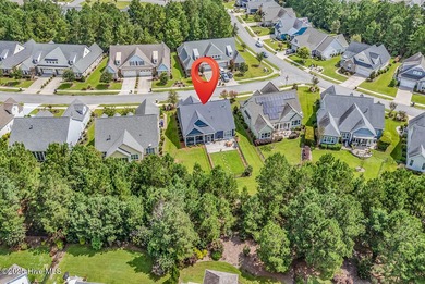 Welcome to exceptional living at 3032 Eno Lane, a custom-built on Cape Fear National At Brunswick Forest in North Carolina - for sale on GolfHomes.com, golf home, golf lot