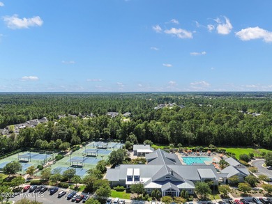 Welcome to exceptional living at 3032 Eno Lane, a custom-built on Cape Fear National At Brunswick Forest in North Carolina - for sale on GolfHomes.com, golf home, golf lot