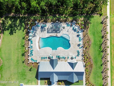 Welcome to exceptional living at 3032 Eno Lane, a custom-built on Cape Fear National At Brunswick Forest in North Carolina - for sale on GolfHomes.com, golf home, golf lot