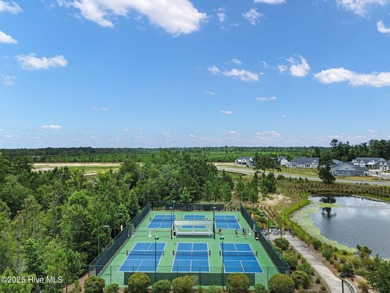 Welcome to exceptional living at 3032 Eno Lane, a custom-built on Cape Fear National At Brunswick Forest in North Carolina - for sale on GolfHomes.com, golf home, golf lot