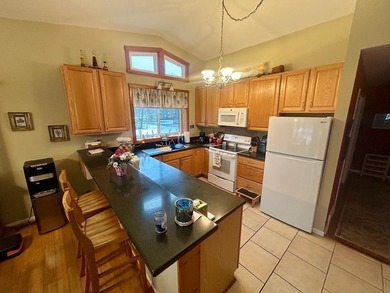 Very nice, well-kept 2 bedroom 2 bath home on the 7th hole of on Sugar Springs Country Club in Michigan - for sale on GolfHomes.com, golf home, golf lot