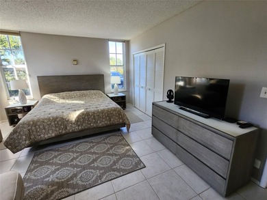 This Lakefront, spacious, furnished, Ground level 3 Bedroom, 2 on Palm-Aire Country Club and Resort - Palms in Florida - for sale on GolfHomes.com, golf home, golf lot