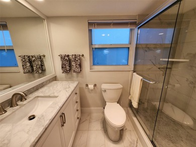 This Lakefront, spacious, furnished, Ground level 3 Bedroom, 2 on Palm-Aire Country Club and Resort - Palms in Florida - for sale on GolfHomes.com, golf home, golf lot