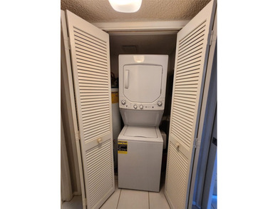 This Lakefront, spacious, furnished, Ground level 3 Bedroom, 2 on Palm-Aire Country Club and Resort - Palms in Florida - for sale on GolfHomes.com, golf home, golf lot