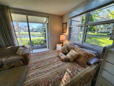 This Lakefront, spacious, furnished, Ground level 3 Bedroom, 2 on Palm-Aire Country Club and Resort - The Oaks in Florida - for sale on GolfHomes.com, golf home, golf lot