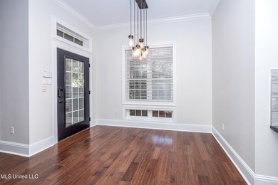 Elegant updated home in the highly sought after Diamondhead on Diamondhead Country Club in Mississippi - for sale on GolfHomes.com, golf home, golf lot