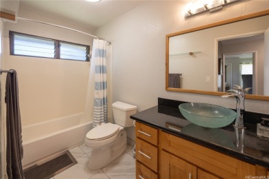 Welcome to Pearlridge! This charming 3-bedroom, 2.5-bathroom on Pearl Country Club in Hawaii - for sale on GolfHomes.com, golf home, golf lot
