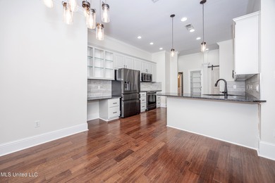 Elegant updated home in the highly sought after Diamondhead on Diamondhead Country Club in Mississippi - for sale on GolfHomes.com, golf home, golf lot