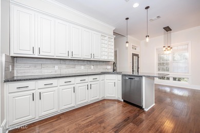 Elegant updated home in the highly sought after Diamondhead on Diamondhead Country Club in Mississippi - for sale on GolfHomes.com, golf home, golf lot