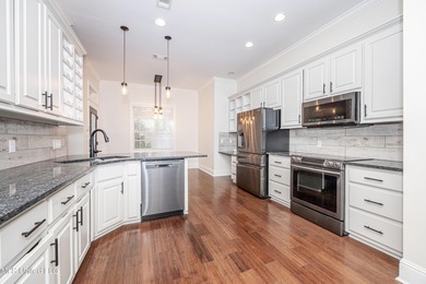 Elegant updated home in the highly sought after Diamondhead on Diamondhead Country Club in Mississippi - for sale on GolfHomes.com, golf home, golf lot