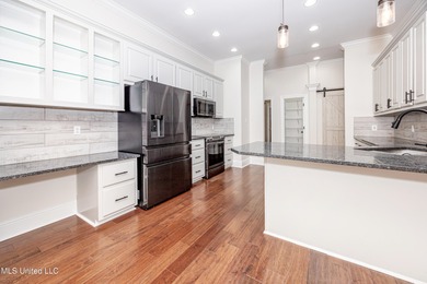 Elegant updated home in the highly sought after Diamondhead on Diamondhead Country Club in Mississippi - for sale on GolfHomes.com, golf home, golf lot