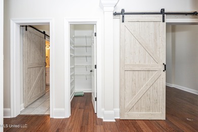 Elegant updated home in the highly sought after Diamondhead on Diamondhead Country Club in Mississippi - for sale on GolfHomes.com, golf home, golf lot