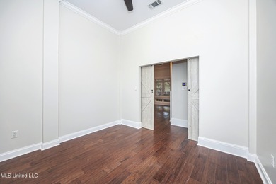 Elegant updated home in the highly sought after Diamondhead on Diamondhead Country Club in Mississippi - for sale on GolfHomes.com, golf home, golf lot