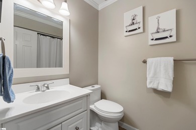 408 Camelot Dr is a beautifully appointed home tucked into the on Holly Tree Country Club in South Carolina - for sale on GolfHomes.com, golf home, golf lot