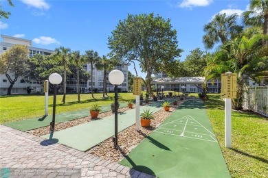 Welcome home! Very bright and updated unit with amazing natural on Palm-Aire Country Club and Resort - Palms in Florida - for sale on GolfHomes.com, golf home, golf lot