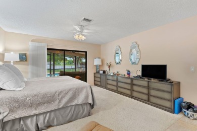 Rare 4-Bedroom CBS Home in Eastpointe with 160' of Breathtaking on Eastpointe Country Club in Florida - for sale on GolfHomes.com, golf home, golf lot