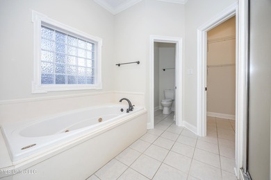 Elegant updated home in the highly sought after Diamondhead on Diamondhead Country Club in Mississippi - for sale on GolfHomes.com, golf home, golf lot