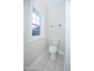 Elegant updated home in the highly sought after Diamondhead on Diamondhead Country Club in Mississippi - for sale on GolfHomes.com, golf home, golf lot