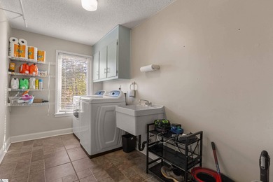 408 Camelot Dr is a beautifully appointed home tucked into the on Holly Tree Country Club in South Carolina - for sale on GolfHomes.com, golf home, golf lot