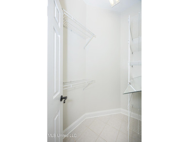 Elegant updated home in the highly sought after Diamondhead on Diamondhead Country Club in Mississippi - for sale on GolfHomes.com, golf home, golf lot