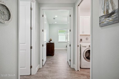 Enjoy care-free paradise living in this RARE & NEWER CABANA BAY on LPGA International Golf Course in Florida - for sale on GolfHomes.com, golf home, golf lot