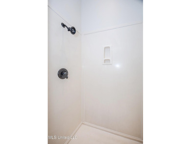 Elegant updated home in the highly sought after Diamondhead on Diamondhead Country Club in Mississippi - for sale on GolfHomes.com, golf home, golf lot