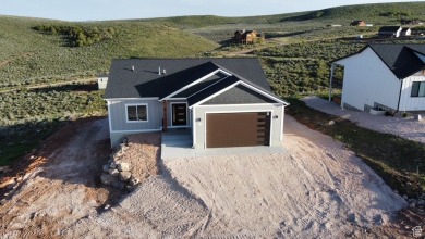 Brand new home 3090 sq ft, 6 bedroom/ 4 bath with an oversized on Bear Lake Golf Course in Utah - for sale on GolfHomes.com, golf home, golf lot