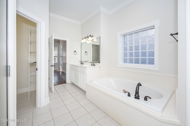 Elegant updated home in the highly sought after Diamondhead on Diamondhead Country Club in Mississippi - for sale on GolfHomes.com, golf home, golf lot