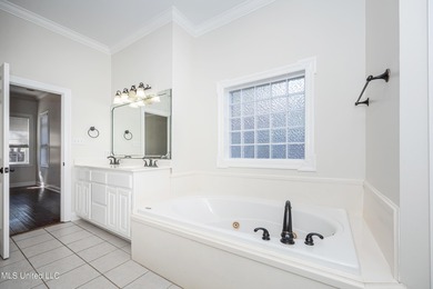 Elegant updated home in the highly sought after Diamondhead on Diamondhead Country Club in Mississippi - for sale on GolfHomes.com, golf home, golf lot