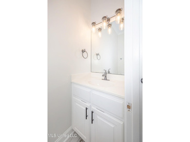 Elegant updated home in the highly sought after Diamondhead on Diamondhead Country Club in Mississippi - for sale on GolfHomes.com, golf home, golf lot