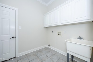 Elegant updated home in the highly sought after Diamondhead on Diamondhead Country Club in Mississippi - for sale on GolfHomes.com, golf home, golf lot