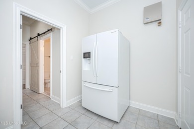 Elegant updated home in the highly sought after Diamondhead on Diamondhead Country Club in Mississippi - for sale on GolfHomes.com, golf home, golf lot