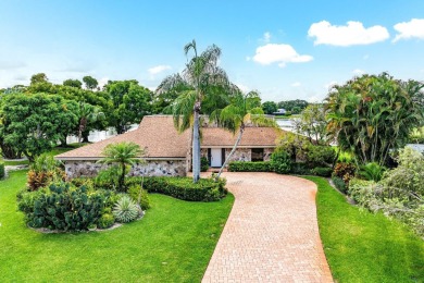 Rare 4-Bedroom CBS Home in Eastpointe with 160' of Breathtaking on Eastpointe Country Club in Florida - for sale on GolfHomes.com, golf home, golf lot