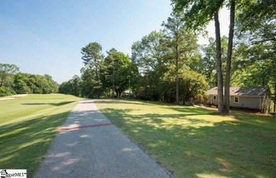 408 Camelot Dr is a beautifully appointed home tucked into the on Holly Tree Country Club in South Carolina - for sale on GolfHomes.com, golf home, golf lot
