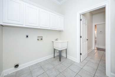 Elegant updated home in the highly sought after Diamondhead on Diamondhead Country Club in Mississippi - for sale on GolfHomes.com, golf home, golf lot