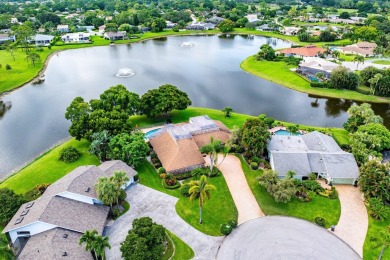 Rare 4-Bedroom CBS Home in Eastpointe with 160' of Breathtaking on Eastpointe Country Club in Florida - for sale on GolfHomes.com, golf home, golf lot