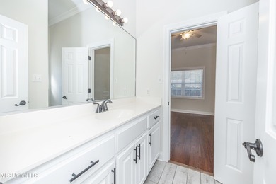 Elegant updated home in the highly sought after Diamondhead on Diamondhead Country Club in Mississippi - for sale on GolfHomes.com, golf home, golf lot