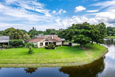 Rare 4-Bedroom CBS Home in Eastpointe with 160' of Breathtaking on Eastpointe Country Club in Florida - for sale on GolfHomes.com, golf home, golf lot