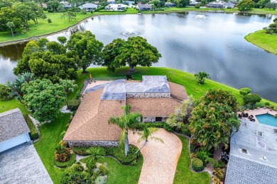 Rare 4-Bedroom CBS Home in Eastpointe with 160' of Breathtaking on Eastpointe Country Club in Florida - for sale on GolfHomes.com, golf home, golf lot